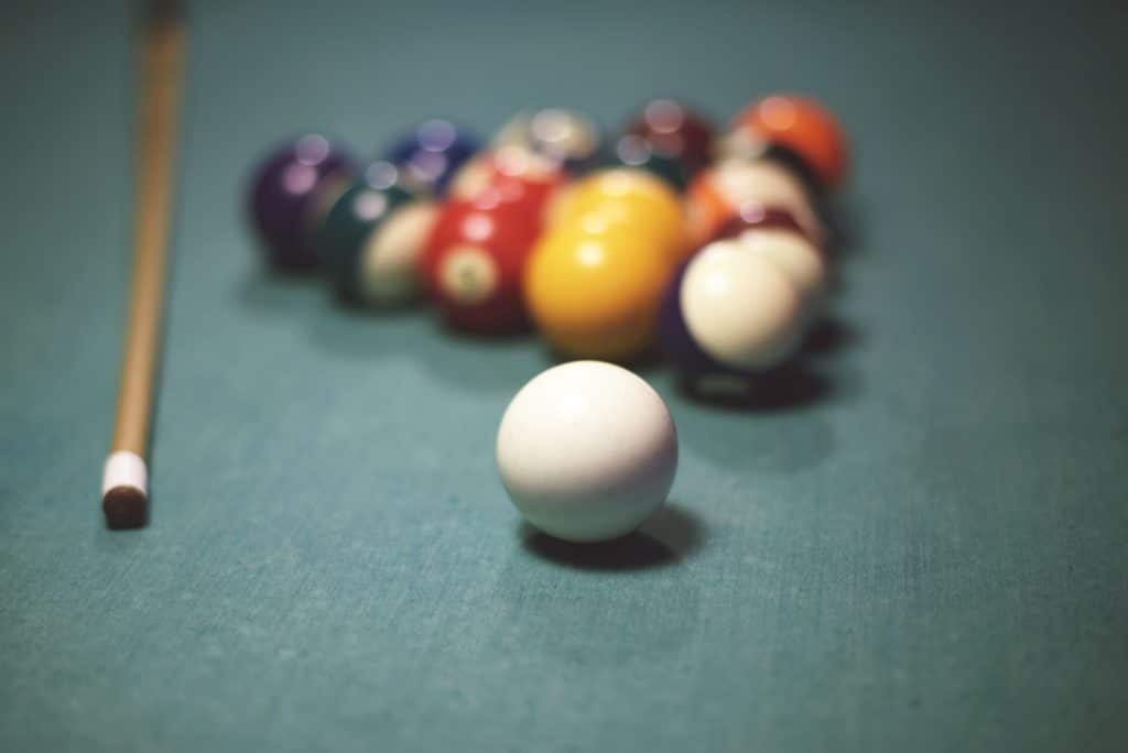 Pool table with pool equipment